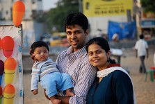 Madhan karky family photos. with wife and son.