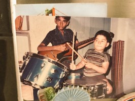 S thaman in childhood- beating drum