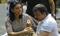 Sister priya dutt comforts an emotional brother sanjay dutt during a news conference outside his residence in mumbai.