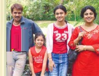 Asharani with family: husband arjun sarja and daughter