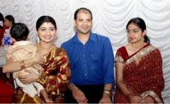 Divya unni with her husband and son