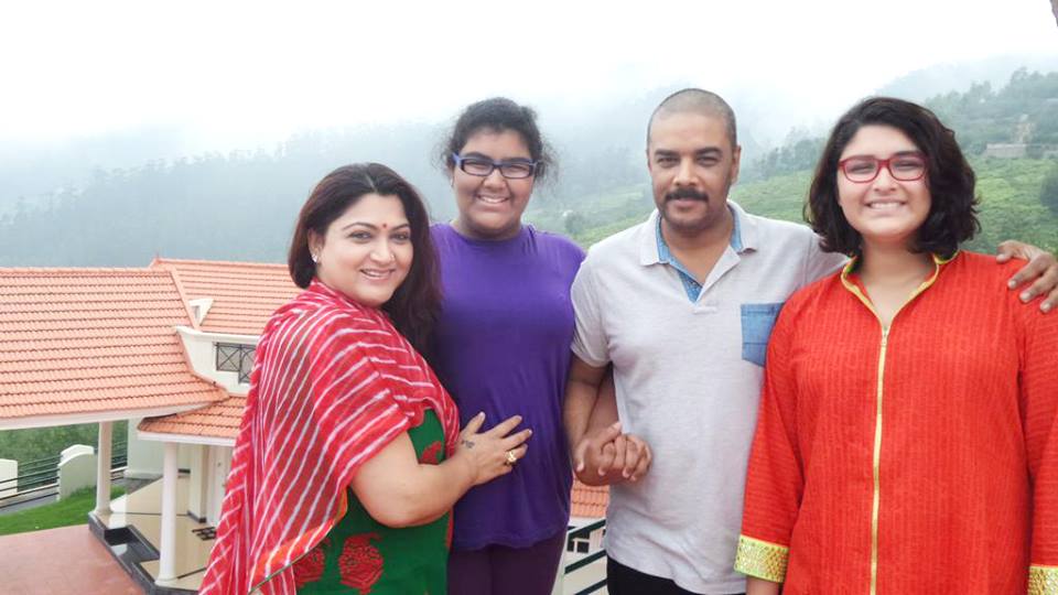 Kushboo with her husband sundar and daughters.