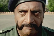 Prakash raj as a cop with a mustache