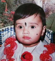 Sreemukhi childhood photo